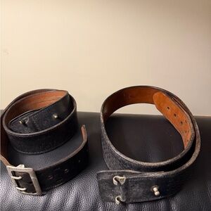 Vintage pair Smith & Wesson police duty belts, likely a Sam Browne 38 & 36